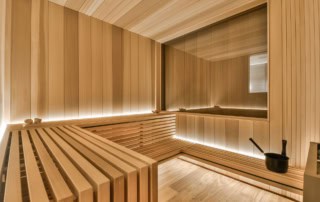 Moderne Sauna mit Holzdesign und entspannter Atmosphäre.